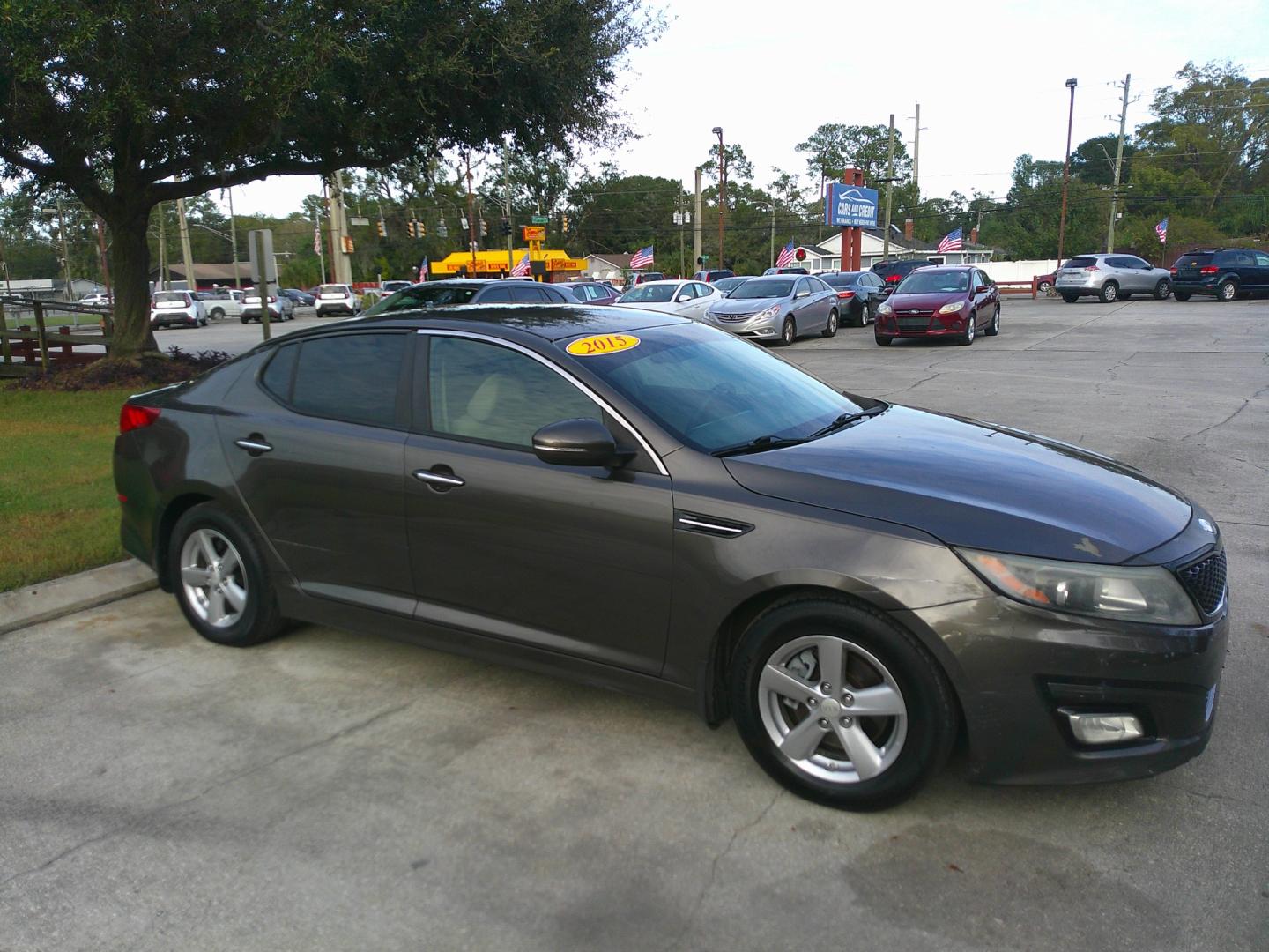 2015 BRONZE KIA OPTIMA LX (5XXGM4A71FG) , located at 1200 Cassat Avenue, Jacksonville, FL, 32205, (904) 695-1885, 30.302404, -81.731033 - Photo#2